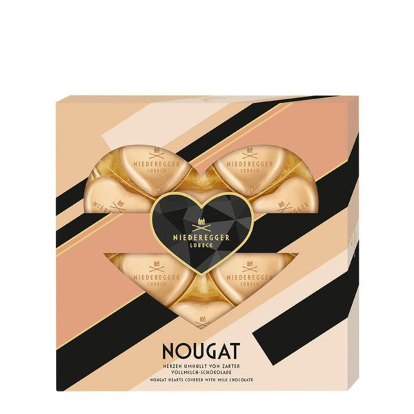 Niederegger Nougathjärtan chokoladeboks med hjerteudskæring og guldfolieindpakket nougat