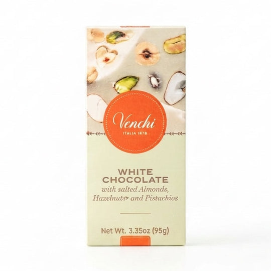 Venchi hvid chokolade med orange logo og billede af smeltet chokolade