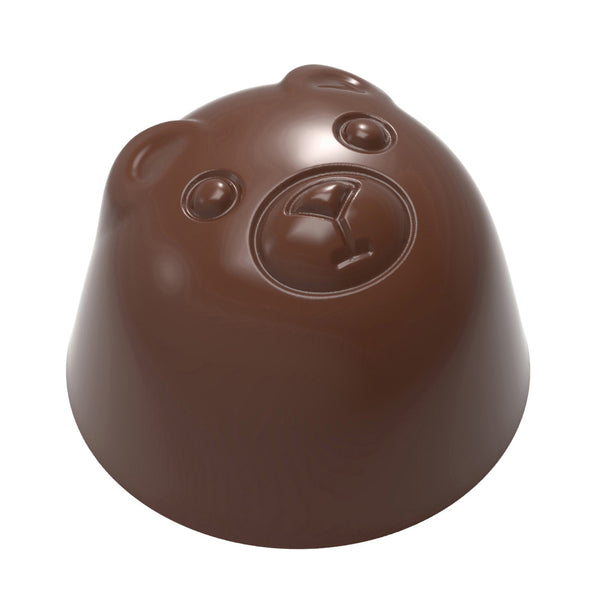 Skinnende chokoladepraline i bjørneform med detaljerede øjne og næse